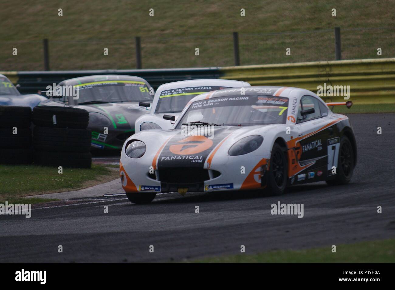 Dalton on Tees, England, 23 June 2018. Greg Johnson driving for Elite Motorsport, number 7, leading a group of cars in Round 11 of the Ginetta Junior Championship at Croft Circuit. Credit: Colin Edwards/Alamy Live News. Stock Photo
