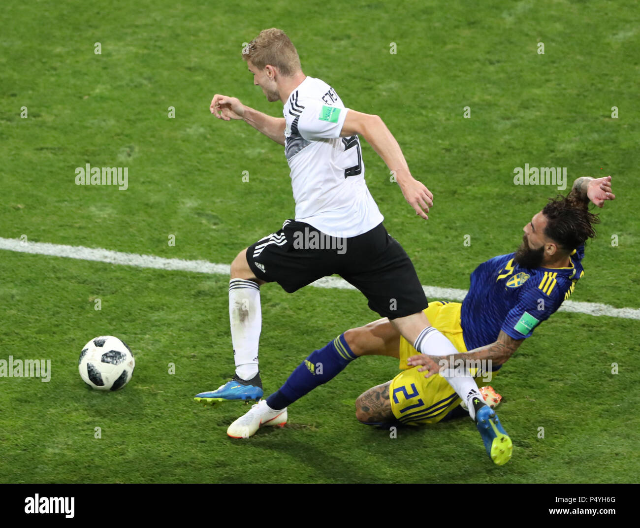 Sochi, Russia. 23rd June, 2018. Timo Werner (L) of Germany vies with Jimmy Durmaz of Sweden during the 2018 FIFA World Cup Group F match between Germany and Sweden in Sochi, Russia, June 23, 2018. Germany won 2-1. Credit: Ye Pingfan/Xinhua/Alamy Live News Stock Photo