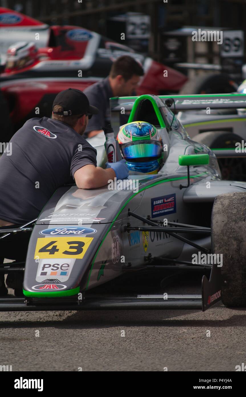 Dalton on Tees, UK, 23 June 2018. British driver Josh Skelton has a final talk with his crew before qualifying in theF4 British Championship at Croft. Credit: Colin Edwards/Alamy Live News. Stock Photo