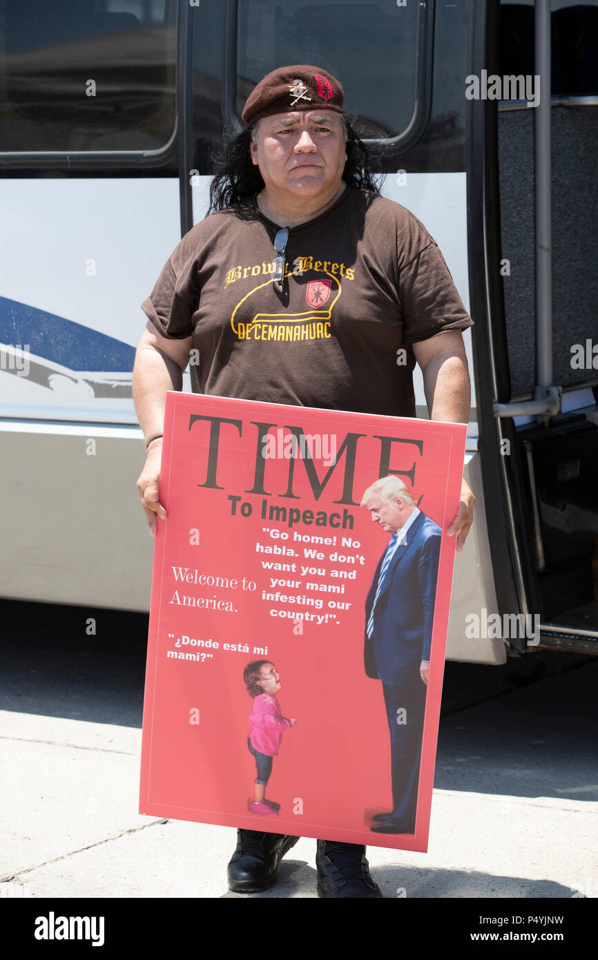 McAllen, Texas June 23, 2018: A Brown Beret holds the Time Magazine cover as U.S. Border Patrol and McAllen police guard an immigrant detention center as a scheduled rally saw protesters block a government bus with immigrant children aboard from leaving.  No arrests were reported. Credit: Bob Daemmrich/Alamy Live News Stock Photo
