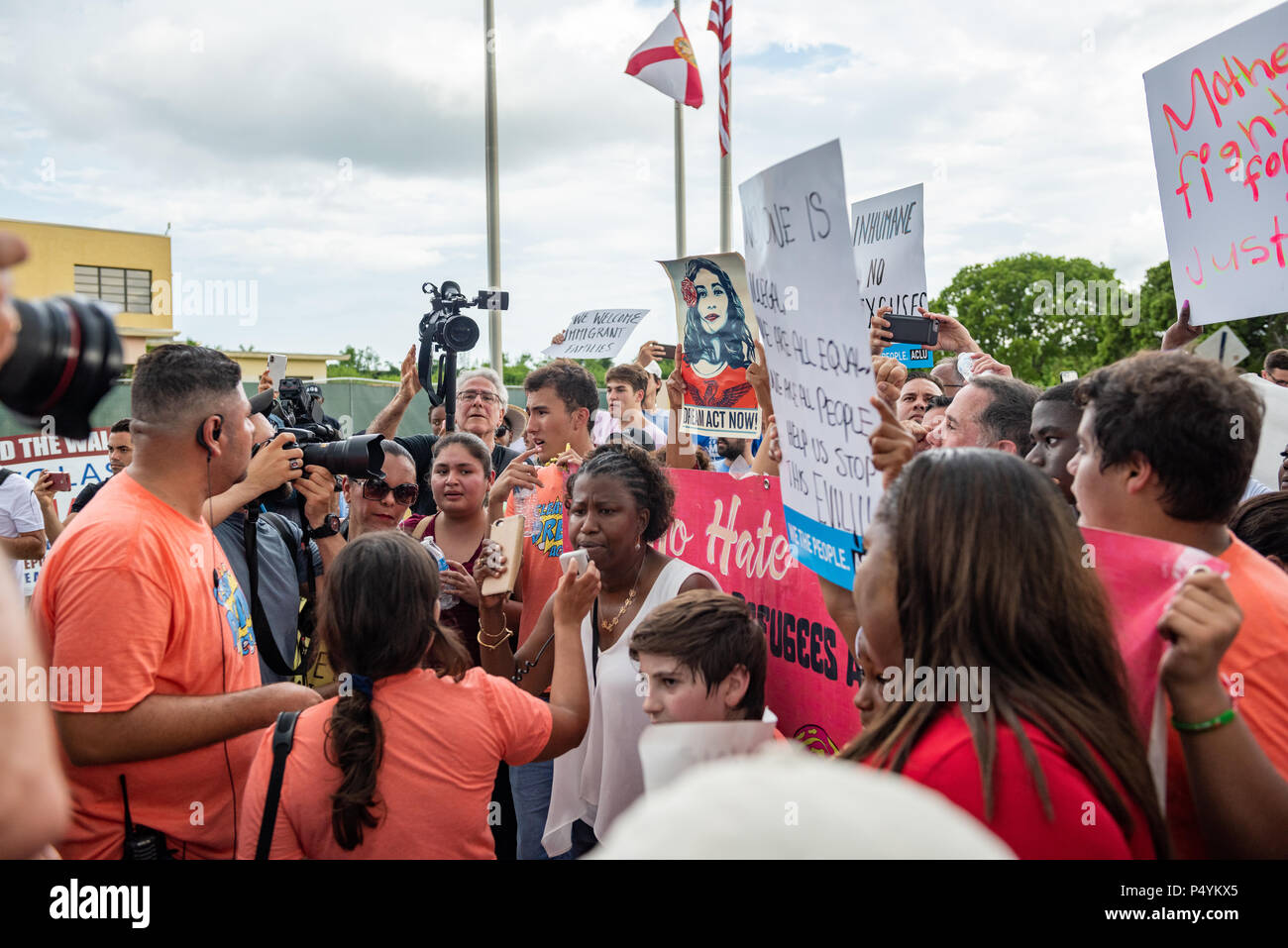Miami, USA. 23rd June 2018. Marchers outside Homestead Temporary Shelter for Unaccompanied Children protesting against Trumps family separation policy. William C. Bunce/Alamy Live News Stock Photo