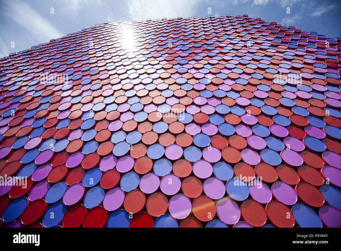London, UK. 23 June 2018 The Mastaba, a temporary sculpture made of stacked barrels in Serpentine Lake in Hyde Park, is made by one of the world's most celebrated artists, famous for ambitious large scale works. Christo and his late wife Jean-Claude took an inspiration from ancient mastabas (benches) structures that originated in first urban civilisatons of Mesopotamia. Twenty metres in height, the structure consists of 7506 horizontally-stacked coloured barrels. The sculpture coincides with Serpentine Galleries exhibition of Christo and Jeanne-Claude's use of barrels in their work over th Cre Stock Photo
