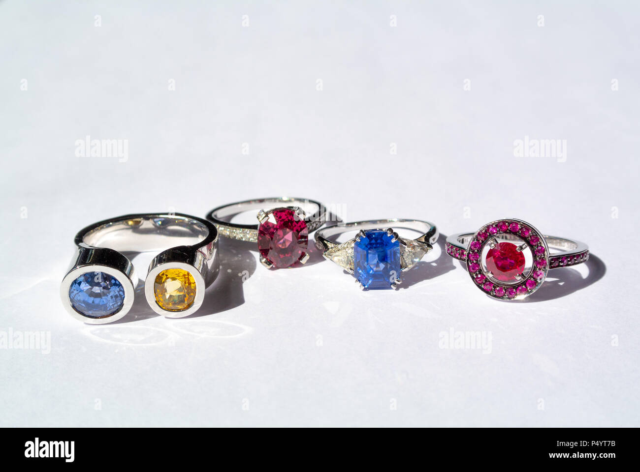 multicolor gems with rings with white background Stock Photo