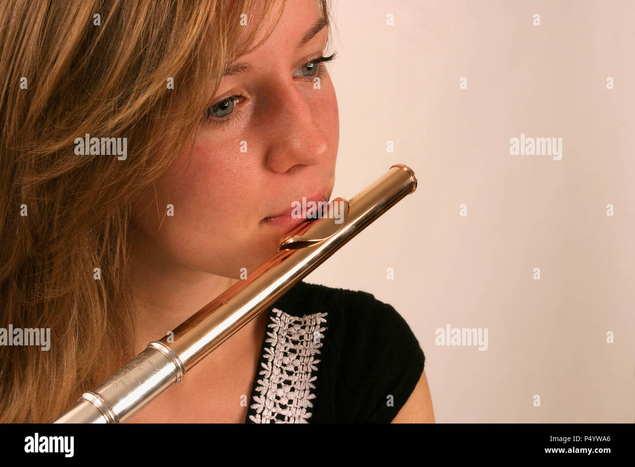Page 3 - Lady Playing Flute High Resolution Stock Photography and Images -  Alamy