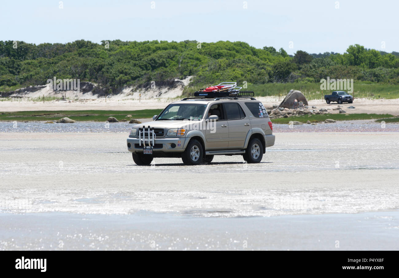 Headed out for a day at the beach - low tide at Crowes Pasture Beach,  East Dennis, Massachusetts on Cape Cod, USA Stock Photo