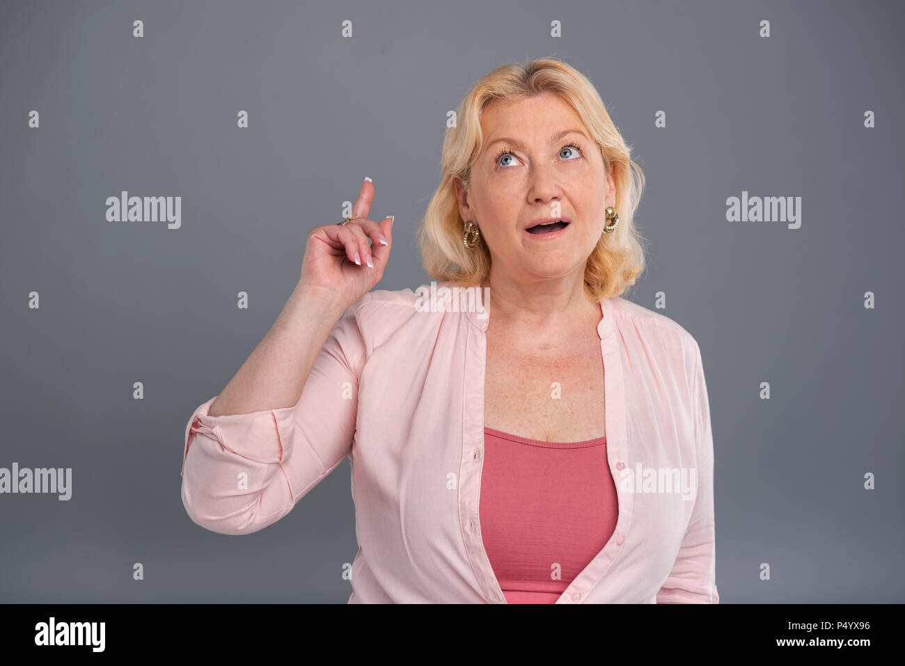 Pleasant senior woman having a sudden idea Stock Photo Alamy