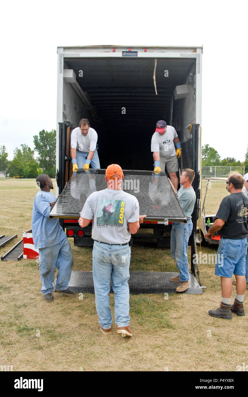 Union Ironworkers volunteer their time to set up the traveling Vietnam