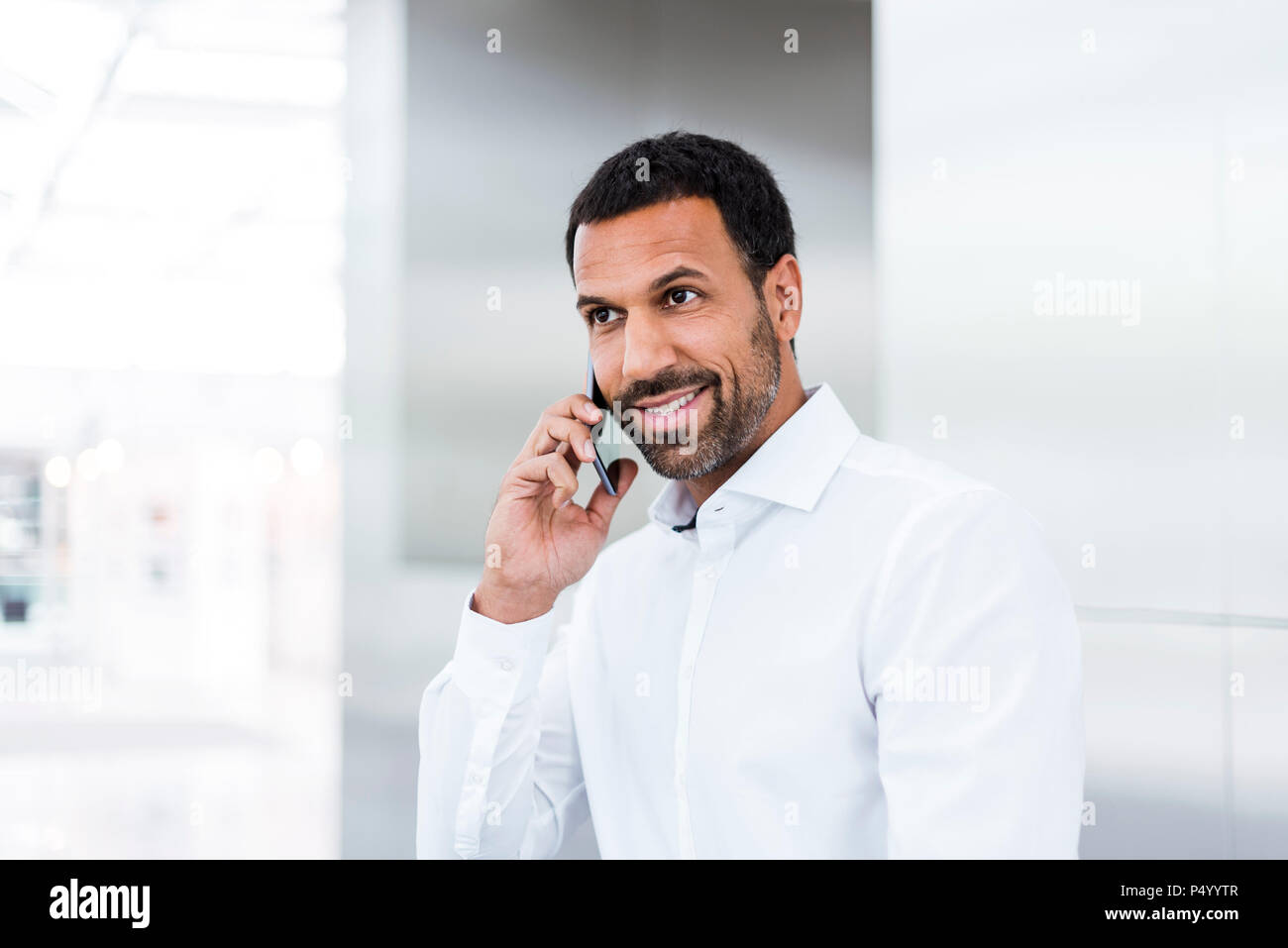 Businessman using smartphone Stock Photo