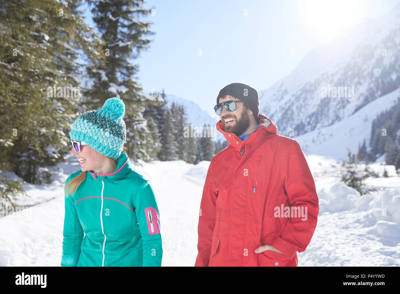 Happy couple in snow-covered landscape Stock Photo