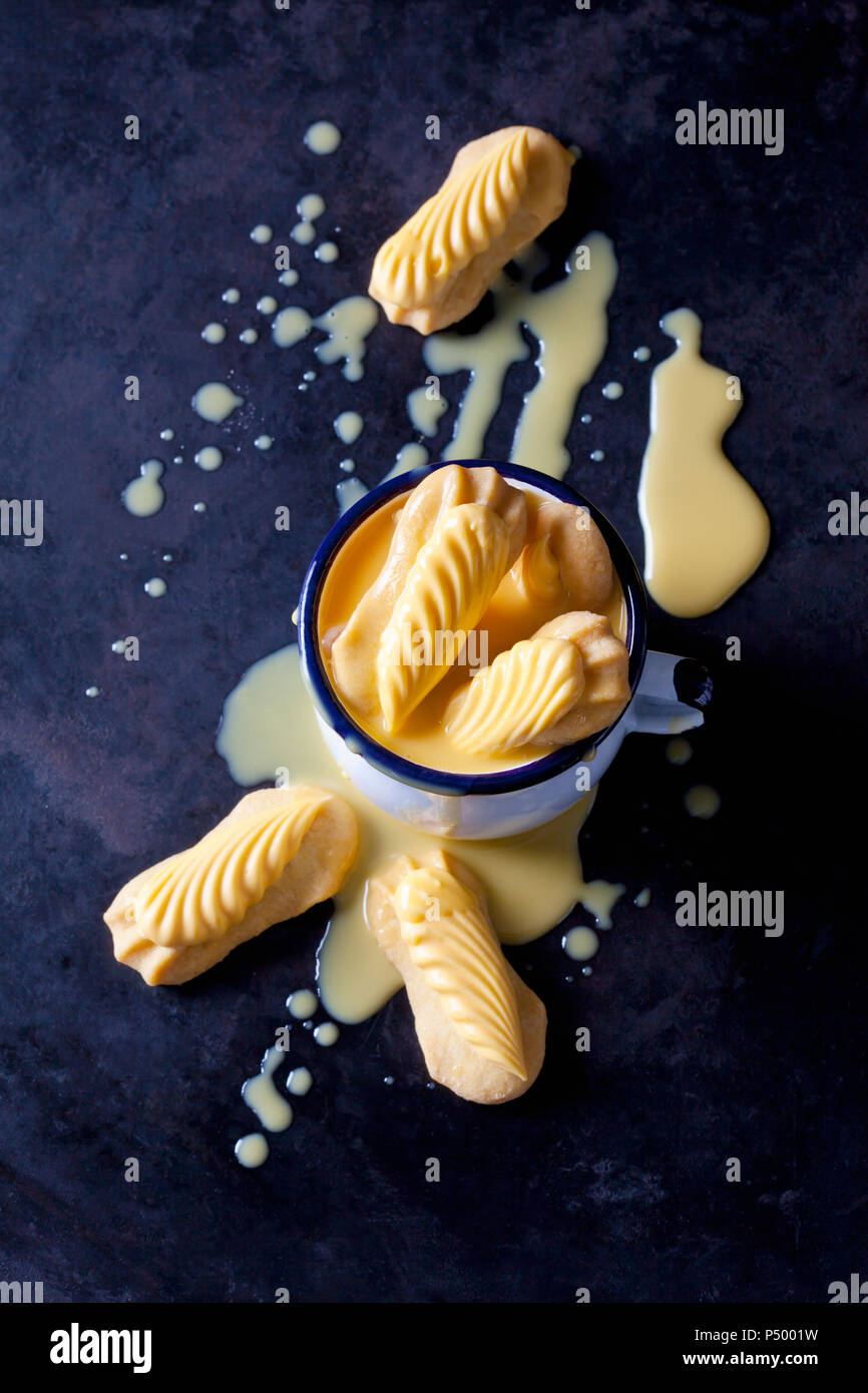 Shortcrust pastry in cup of egg liquer Stock Photo