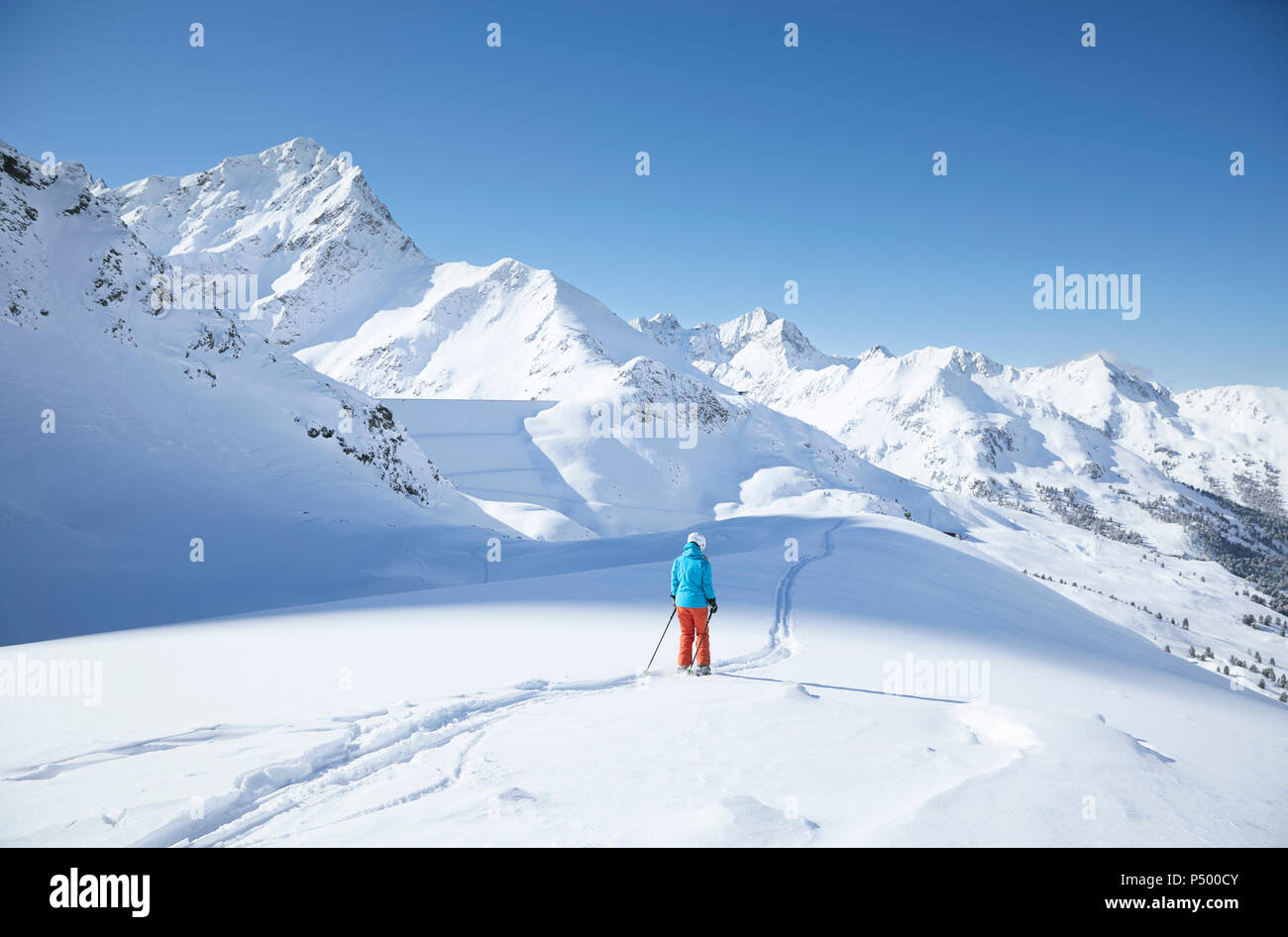Austria, Tyrol, Kuehtai, female skier in winter landscape Stock Photo