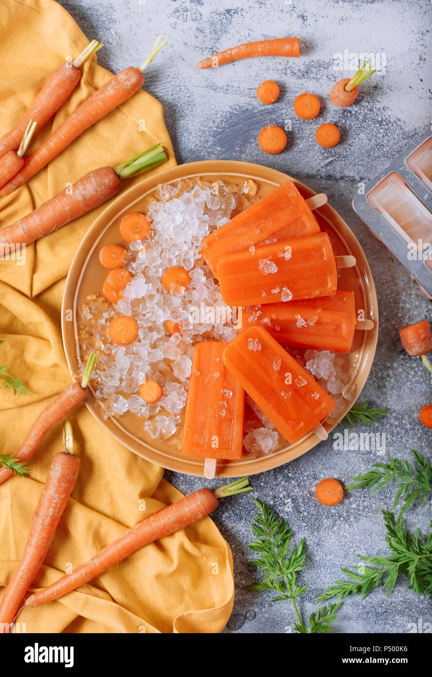 Carrot ice lollies Stock Photo