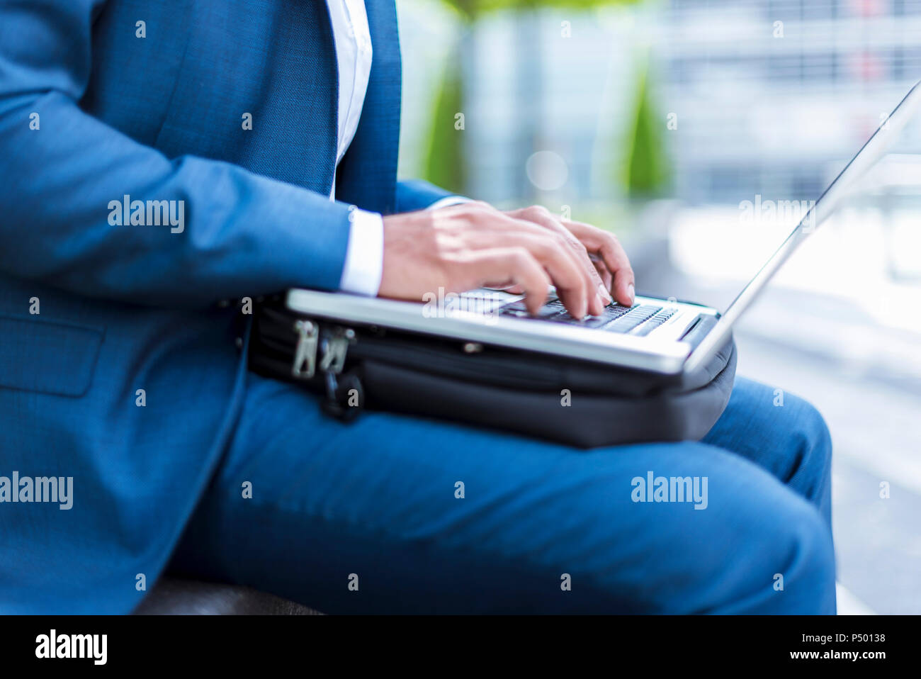 Businessman using laptop Stock Photo