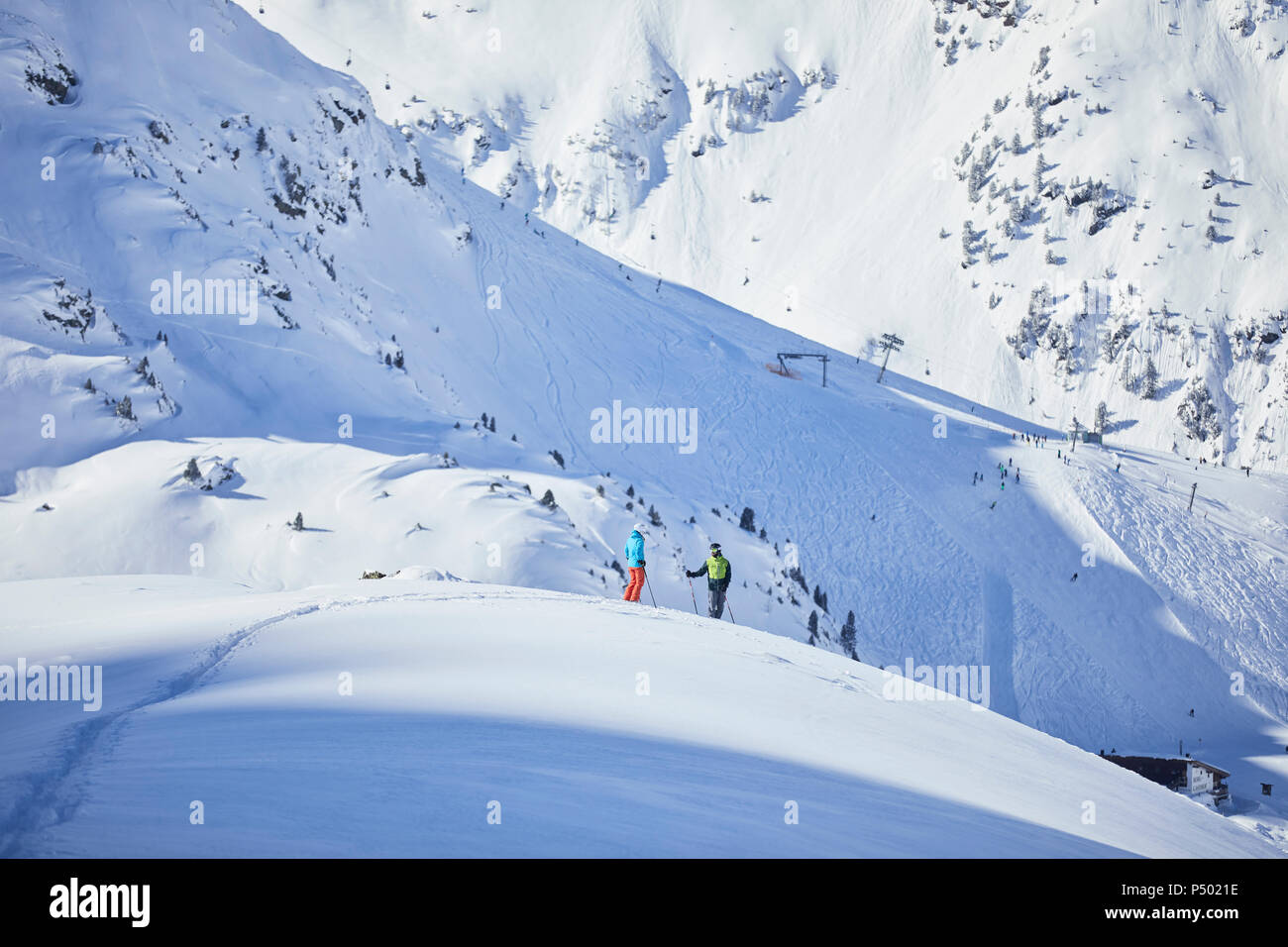 Austria, Tyrol, Kuehtai, two skiers in winter landscape Stock Photo