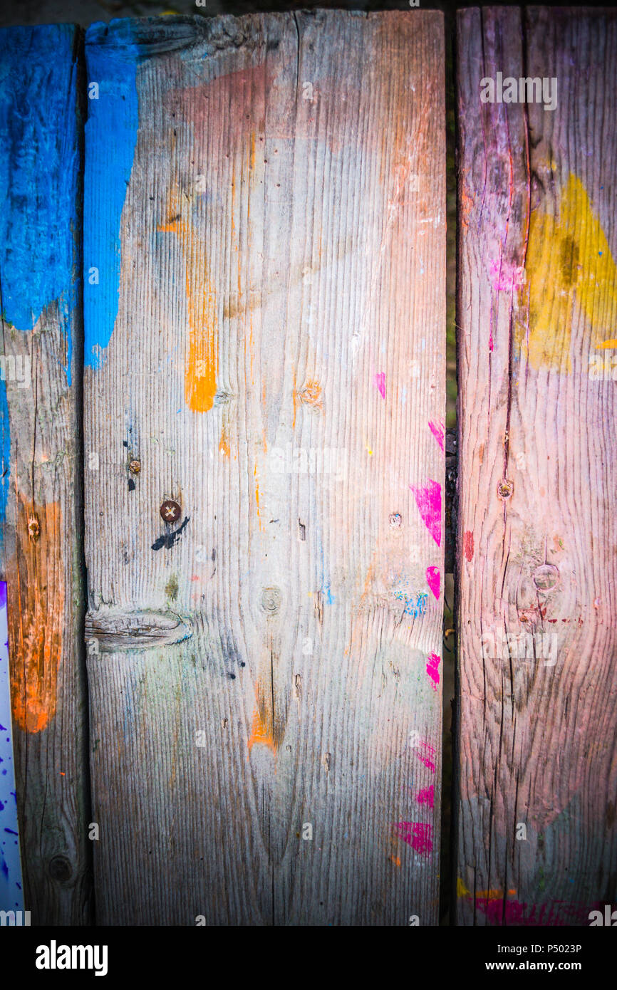 abstract wood background with streaks of color paint filter Stock Photo