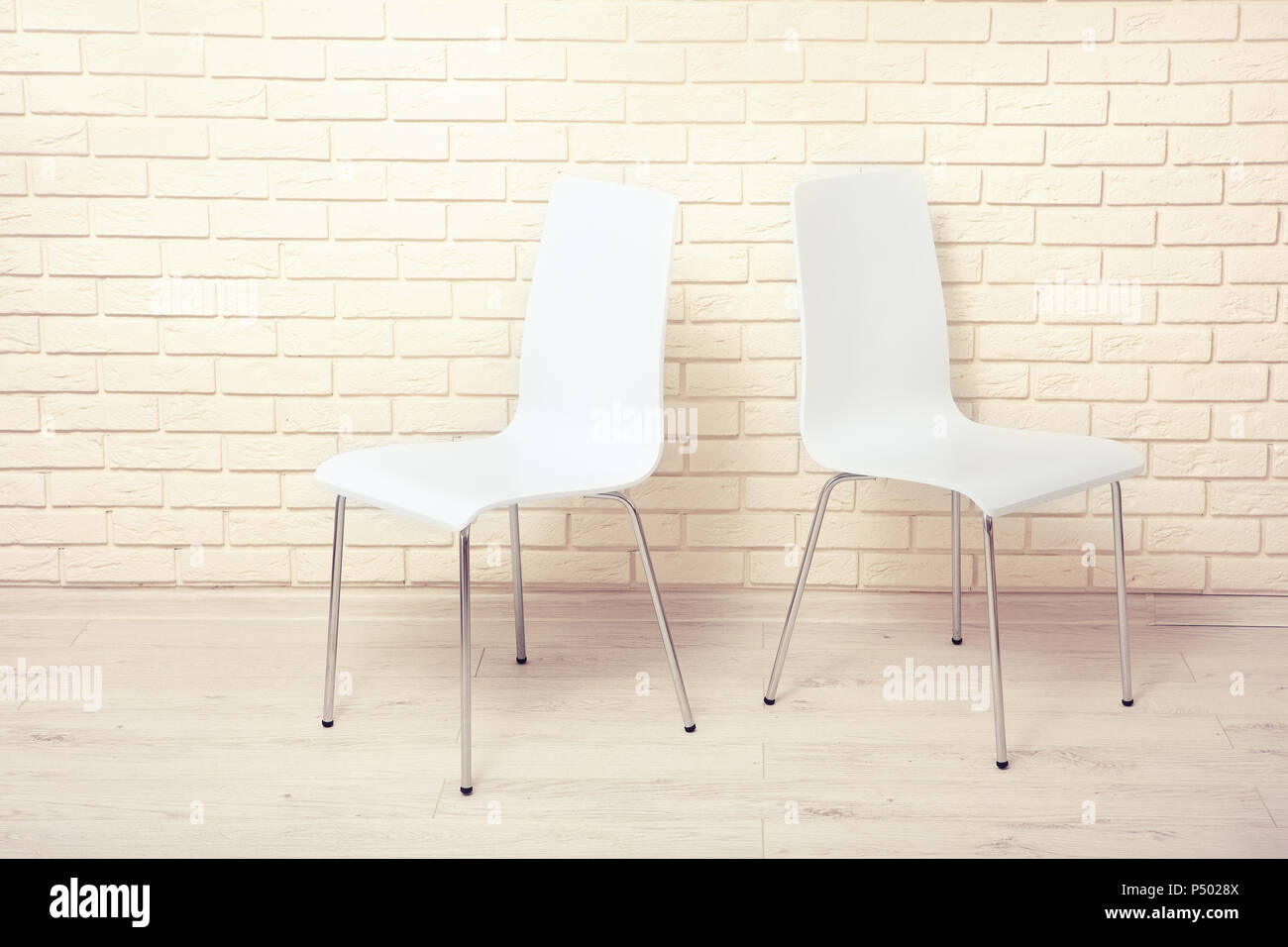 White Chairs Near The White Wall For Interior Or Graphic