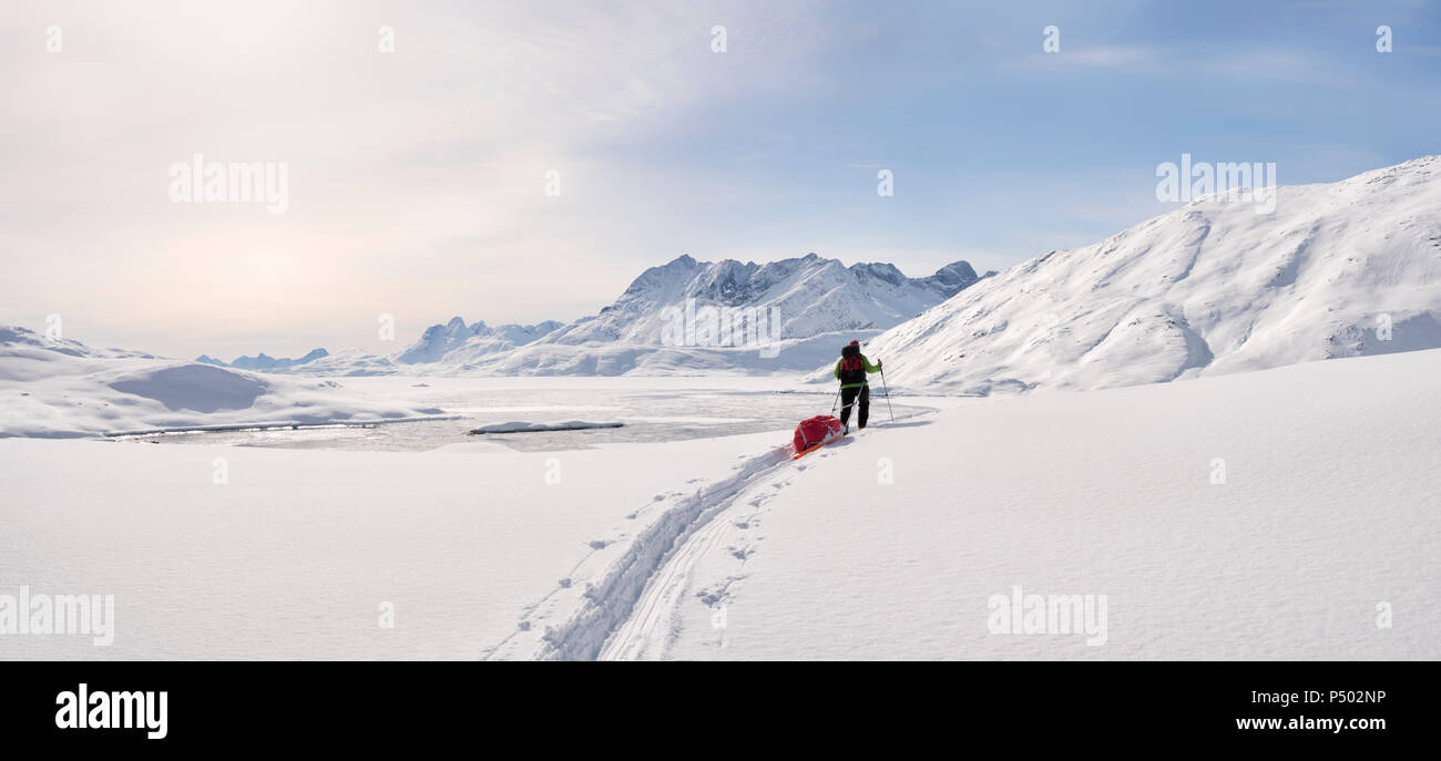 Greenland, Schweizerland Alps, Kulusuk, Tasiilaq, female ski tourer Stock Photo