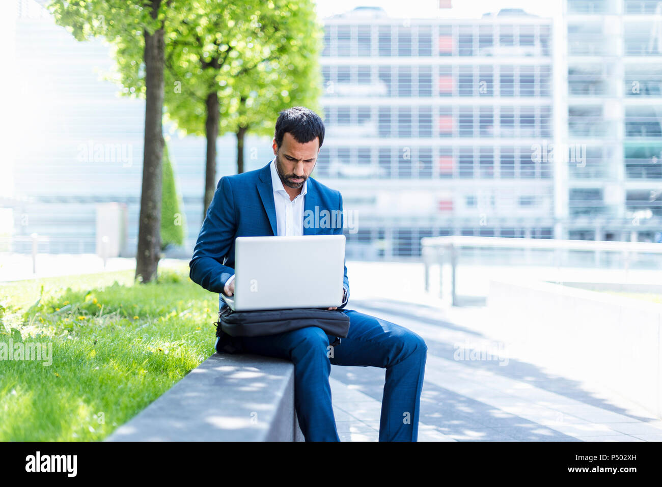Businessman using laptop Stock Photo