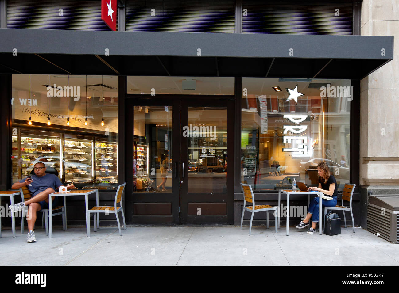 Pret A Manger, 1 Astor Place, New York, NY. exterior storefront of a sandwich shop, and sidewalk cafe in the East Village neighborhood of Manhattan. Stock Photo