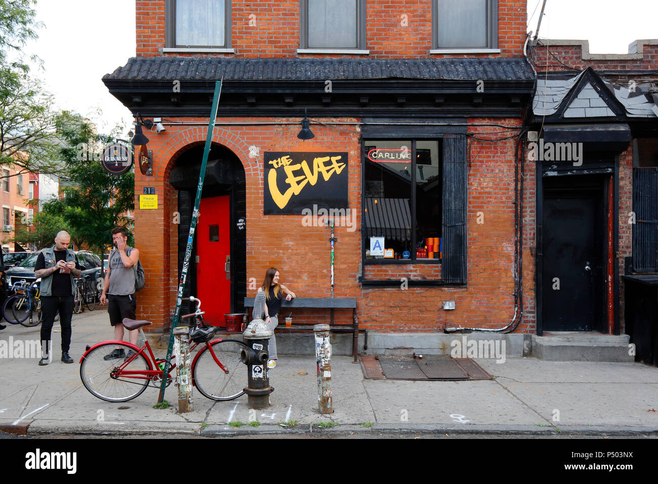 The Levee, 212 Berry St, Brooklyn, NY. exterior storefront of a bar in the Williamsburg neighborhood. Stock Photo