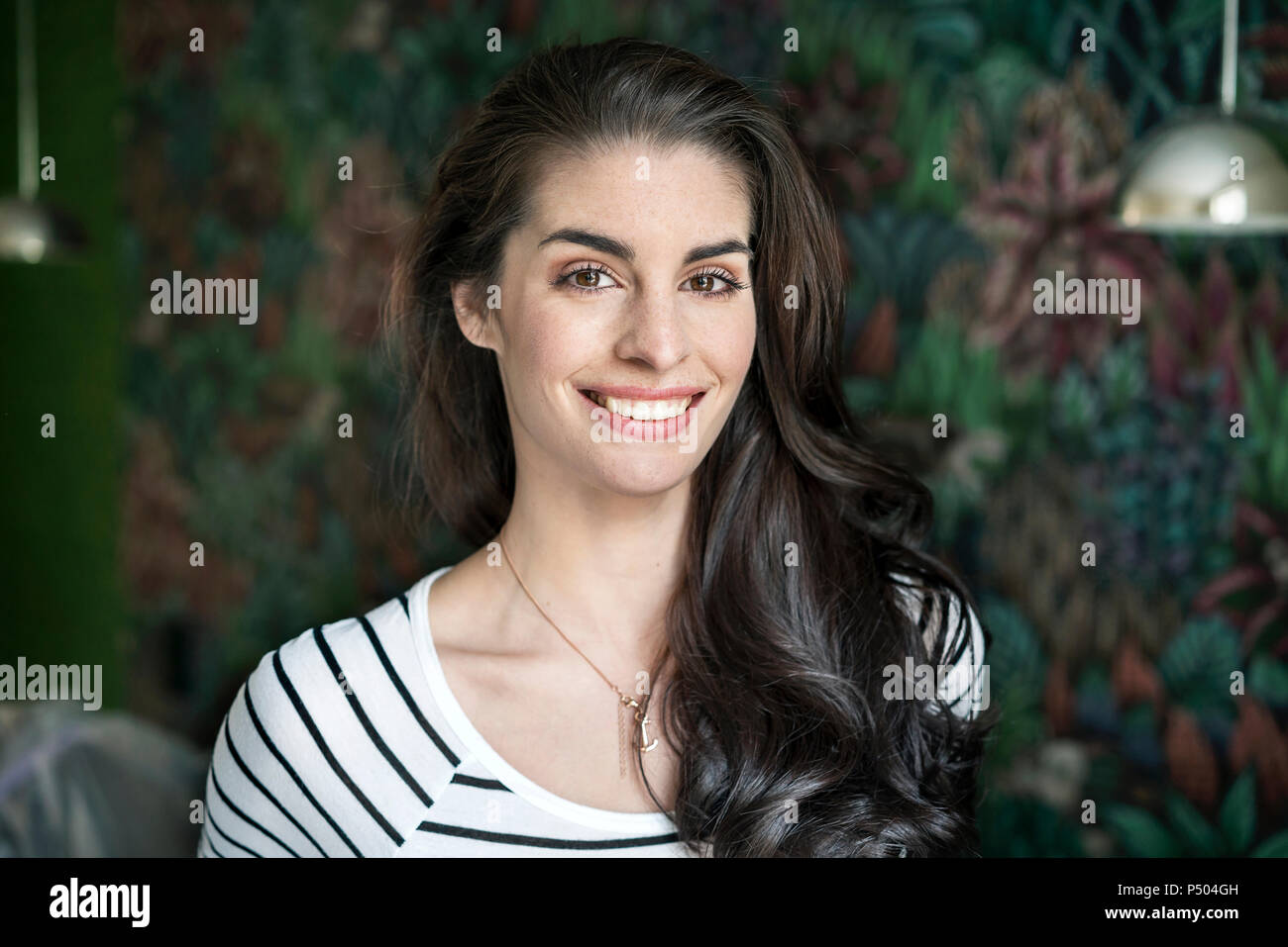 Portrait of a beautiful, smiling young woman Stock Photo - Alamy