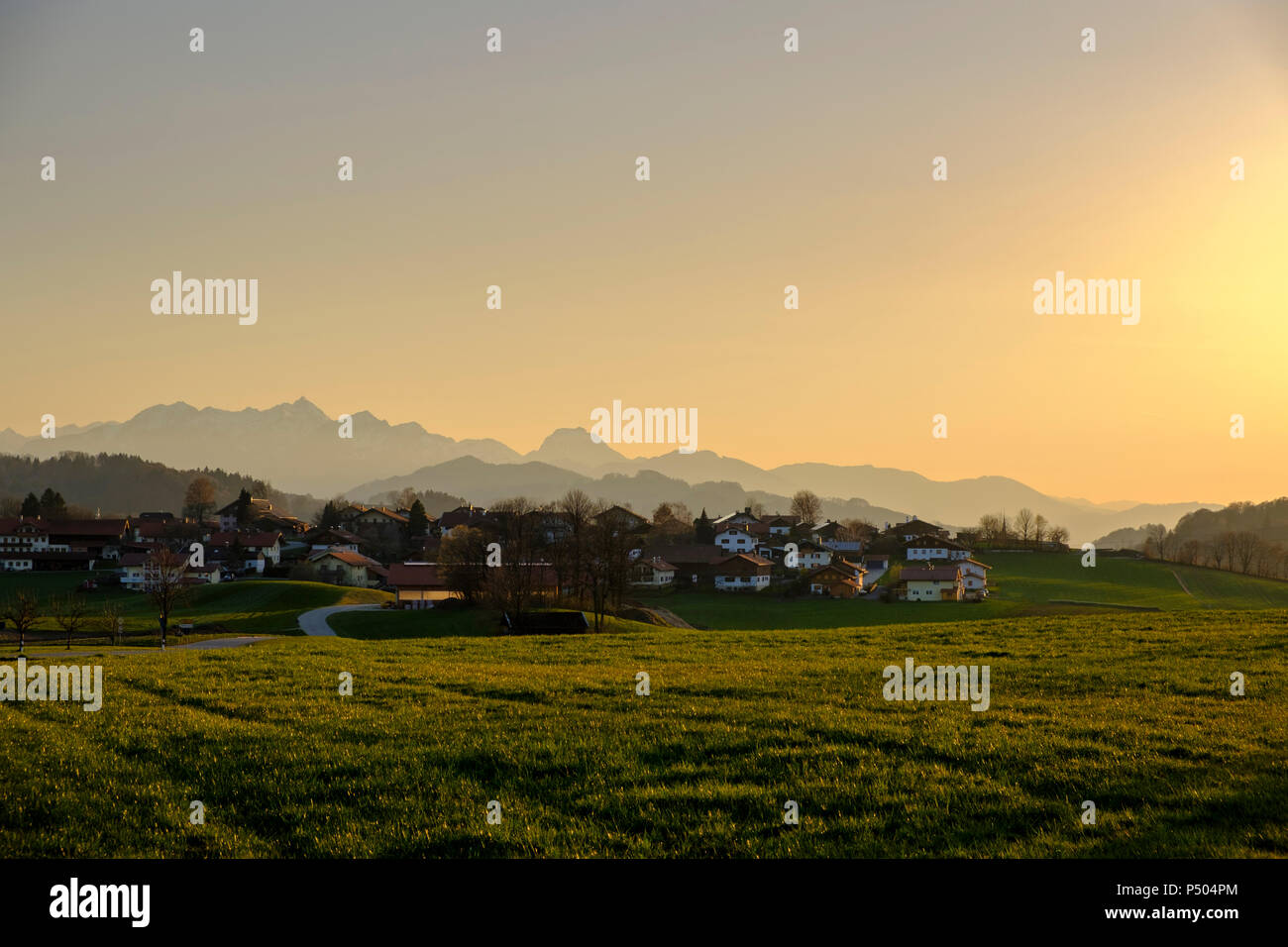 Germany, Bavaria, Chiemgau, Alps, Leiten at sunset Stock Photo
