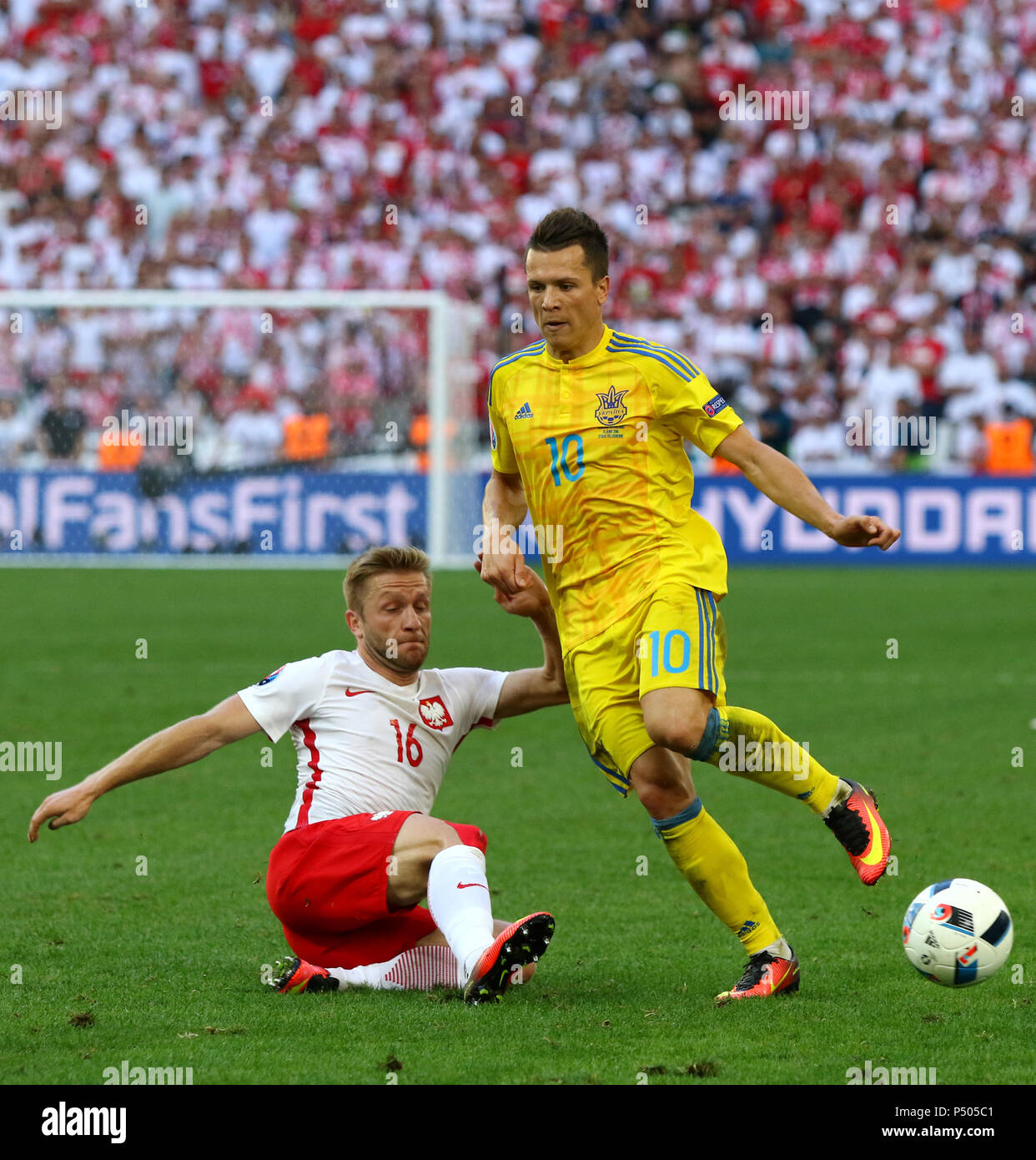 MARSEILLE, FRANCE - JUNE 21, 2016: Jakub Blaszczykowski of Poland (L) fights for a ball with Yevhen Konoplyanka of Ukraine during their UEFA EURO 2016 Stock Photo