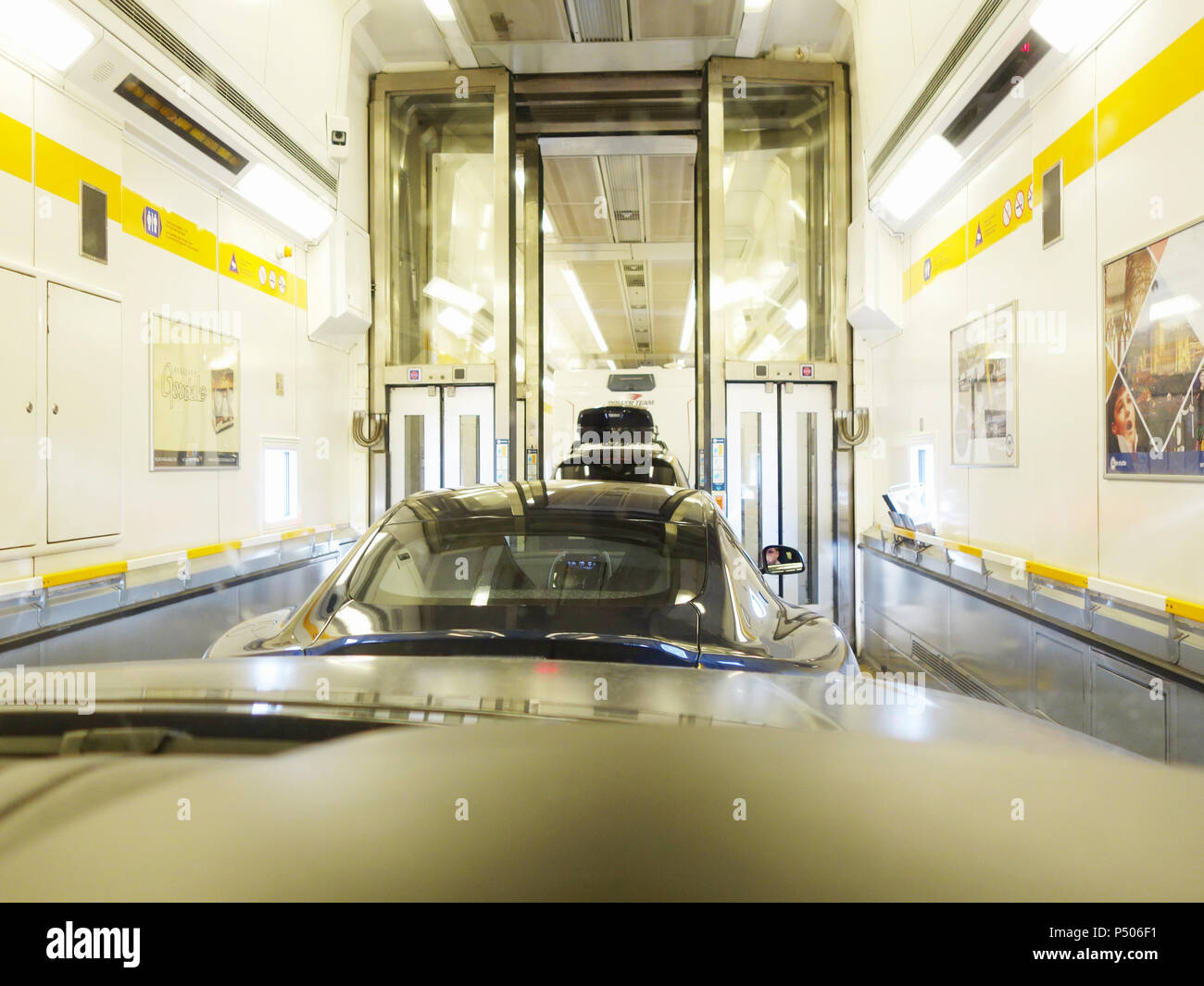 Drivers eye view of the drive in a car onto the eurotunnel train Stock Photo