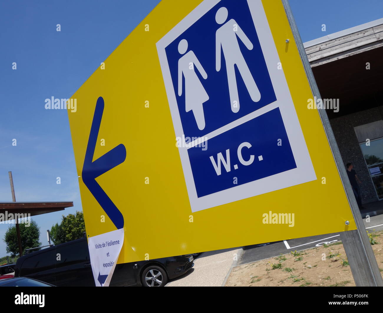 Motorway sevice area bathroom loo direction sign Stock Photo
