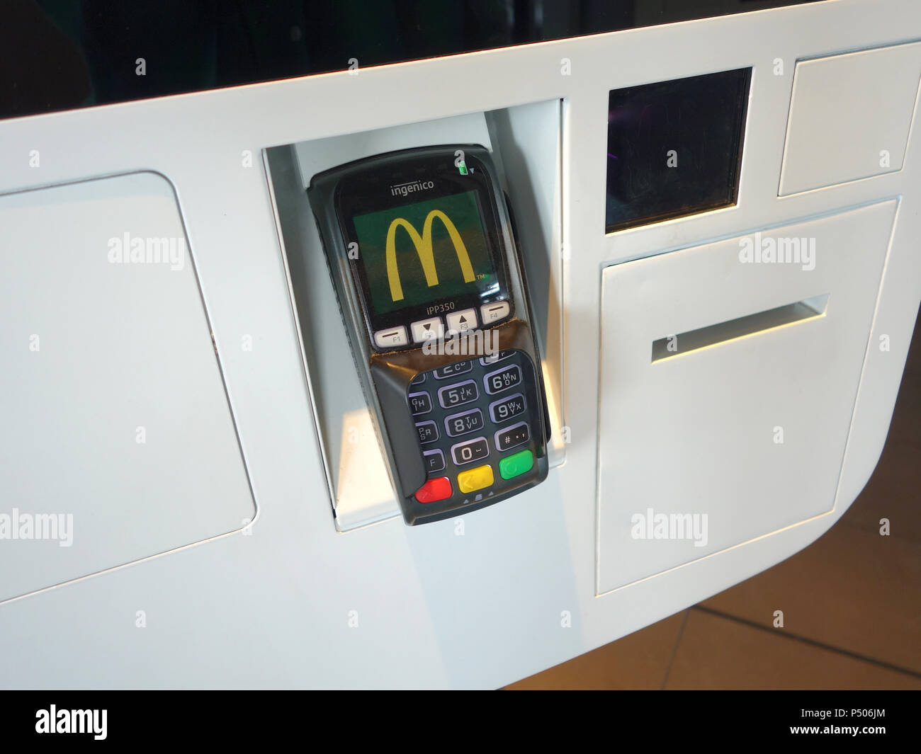 Priority fast order machines plus for disabled the low access helps at McDonald's in Saint-Étienne-du-Rouvray, France Stock Photo
