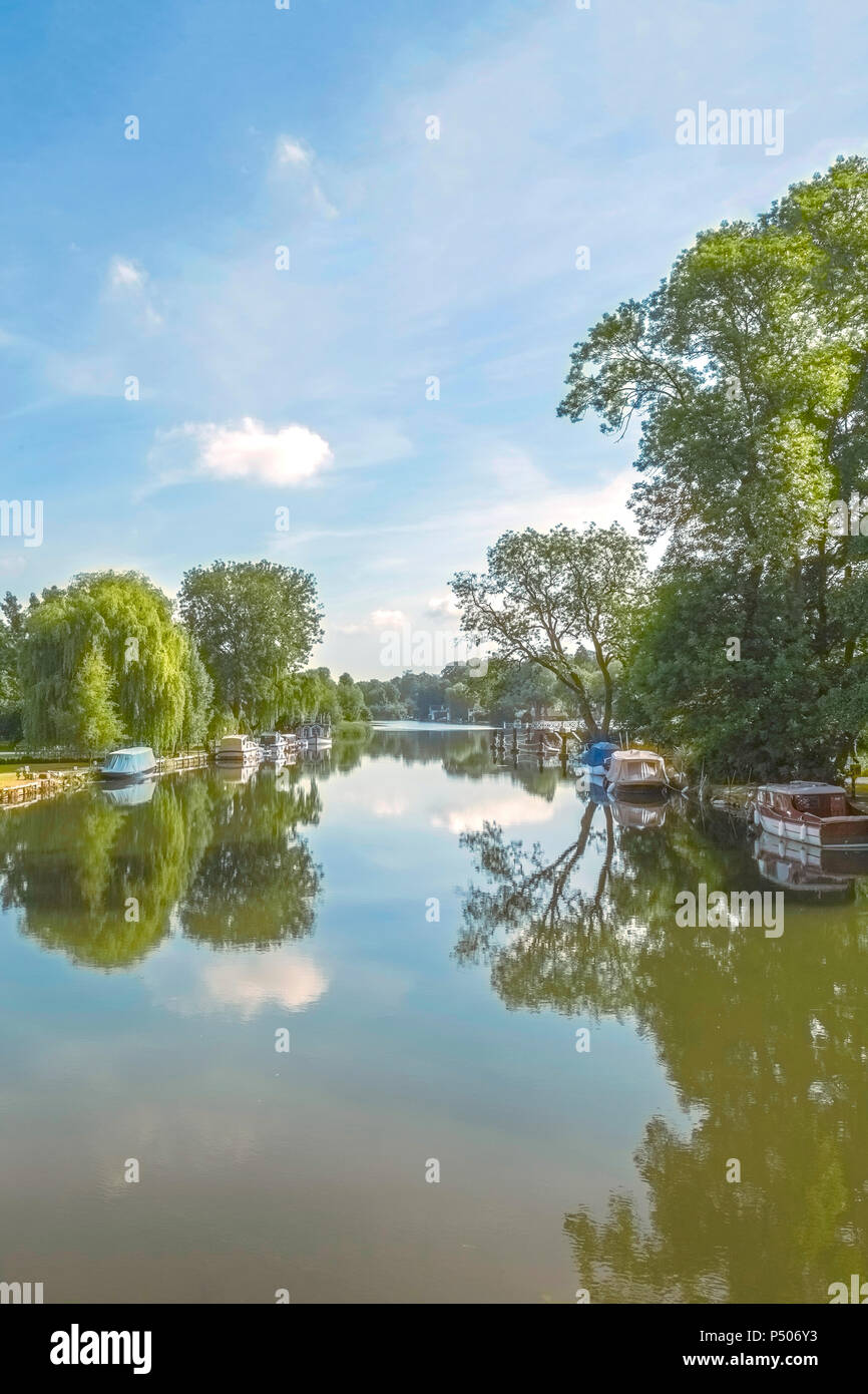 Tranquil early morning mood with scenic reflections on River Thames in Streatley, West Berkshire, England, Great Britain, United Kingdom. Stock Photo
