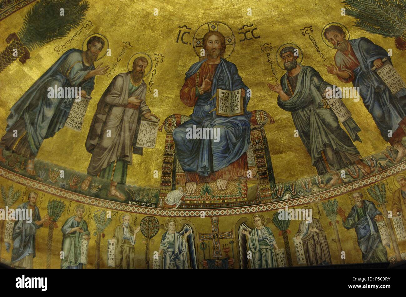 Italy. Rome. Basilica of St. Paul Outside the Walls. Mosaic of apse. Made by a Venetian artist. Christ is flanked by teh Apostles Peter, Paul, Andrew and Luke.19th century reconstruction (after fire 1823), of the 13th century original. Stock Photo