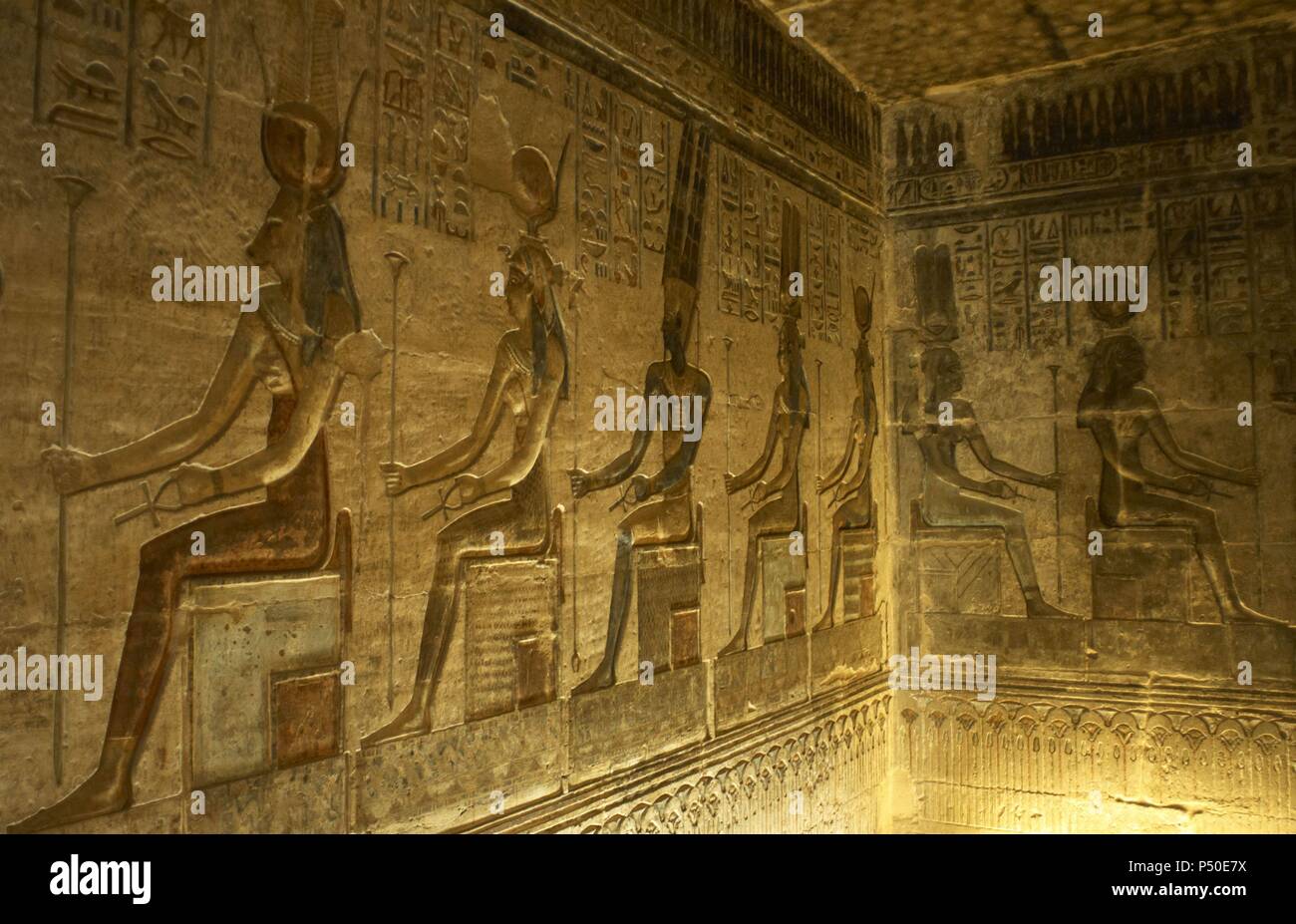 slikken Manoeuvreren inhoud Ptolemaic temple of Hathor and Maat. Polychrome reliefs that decorate the  interior. Seated gods. Deir el-Medina. Egypt Stock Photo - Alamy