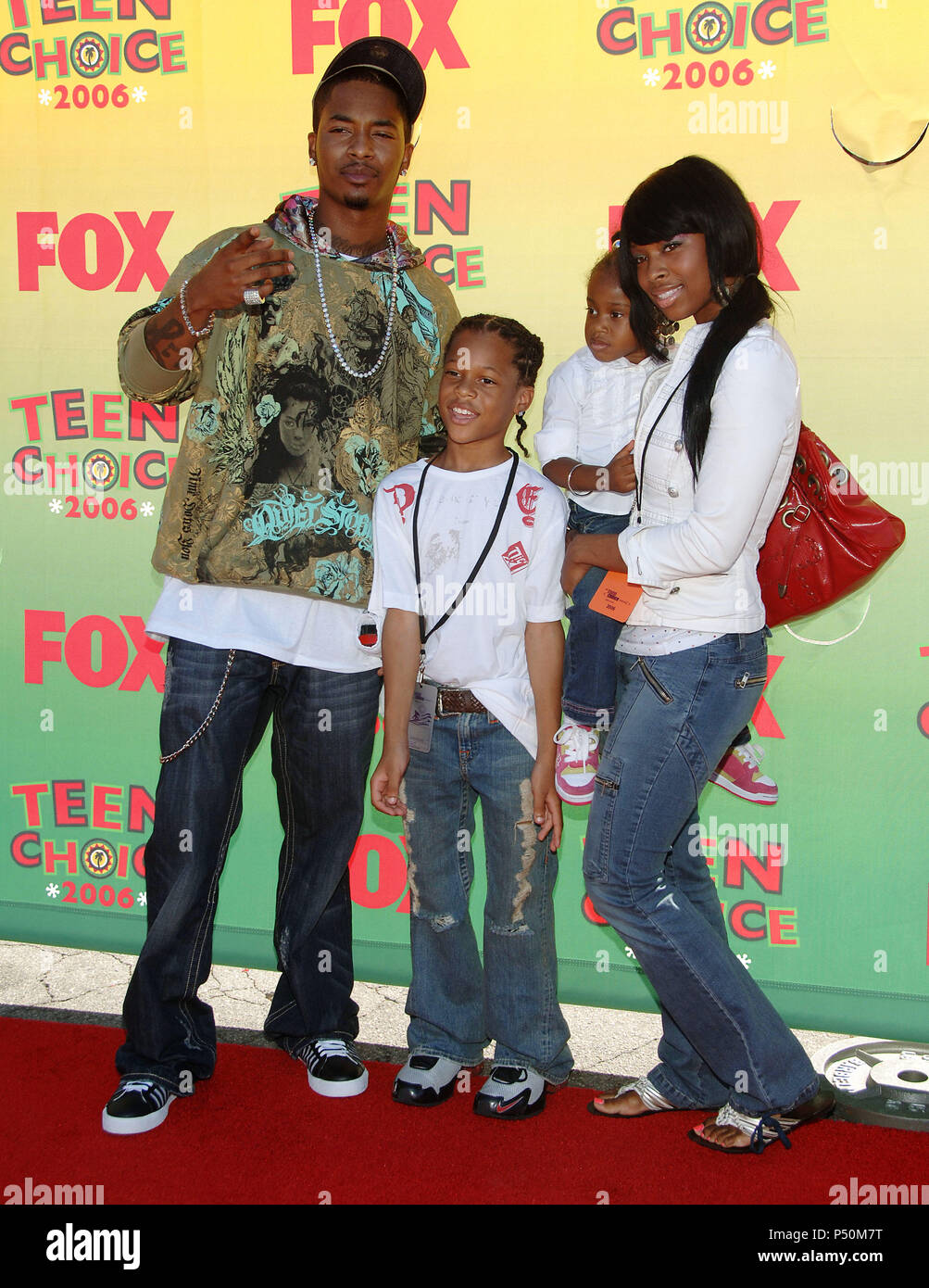 Chingy with wife and kids at the TEEN CHOICE Awards at the Universal Amphitheatre  in Los Angeles. August 20, 2006.  full length eye contact family          -            Chingy family012.jpgChingy family012  Event in Hollywood Life - California, Red Carpet Event, USA, Film Industry, Celebrities, Photography, Bestof, Arts Culture and Entertainment, Topix Celebrities fashion, Best of, Hollywood Life, Event in Hollywood Life - California,  backstage trophy, Awards show, movie celebrities, TV celebrities, Music celebrities, Topix, Bestof, Arts Culture and Entertainment, Photography,    inquiry tsu Stock Photo