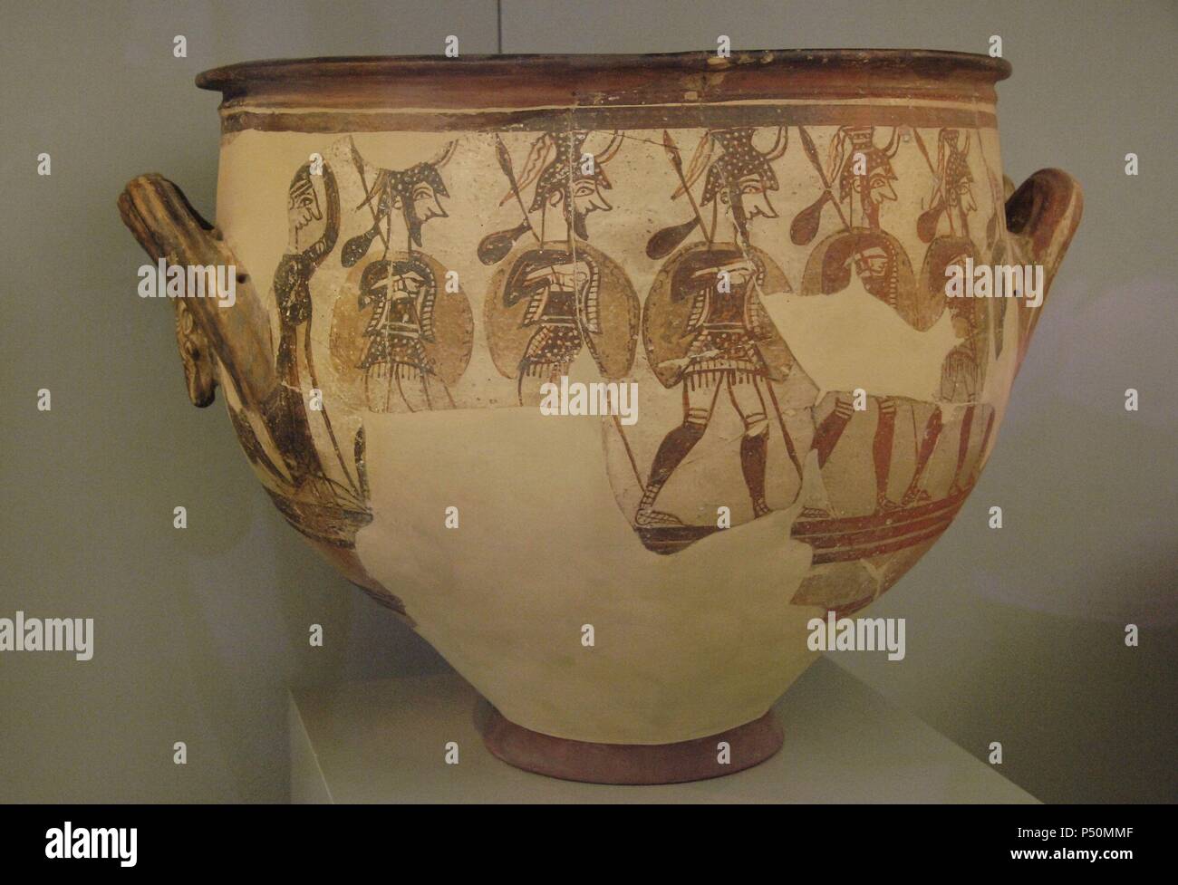 Krater of the Warriors depicting a woman goodbying six warriors.   Dated between 1200-1100 B.C. Mycenae. National Archaeological Museum. Athens. Greece. Stock Photo
