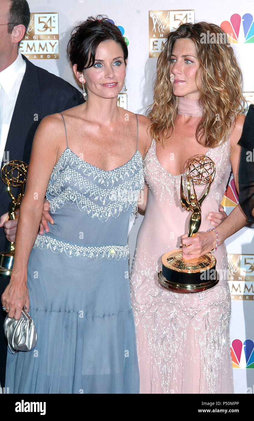 Courteney Cox and Jennifer Aniston, backstage at the 54th Annual Primetime  Emmy Awards at the Shrine Auditorium in Los Angeles. September 22, 2002. -  CoxCourtney AnistonJenn36.jpgCoxCourtney AnistonJenn36 Event in Hollywood  Life -