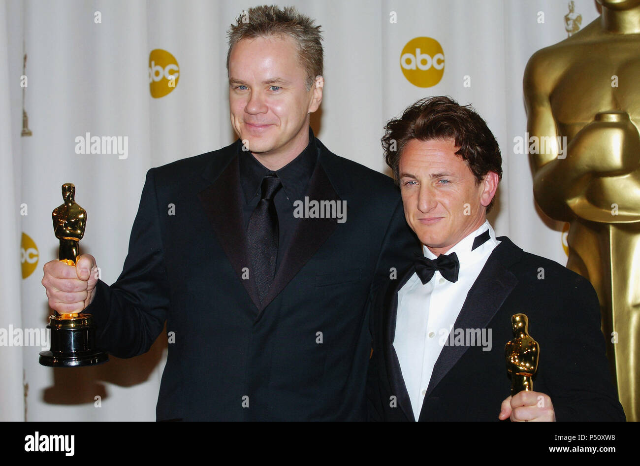 Winner Best Supporting Actor Tim Robbins and Winner Best Actor Sean Penn  backstage at the 76th Academy Awards - Oscars 2004 - at the Kodak Theatre  in Los Angeles. February 29, 2004. -