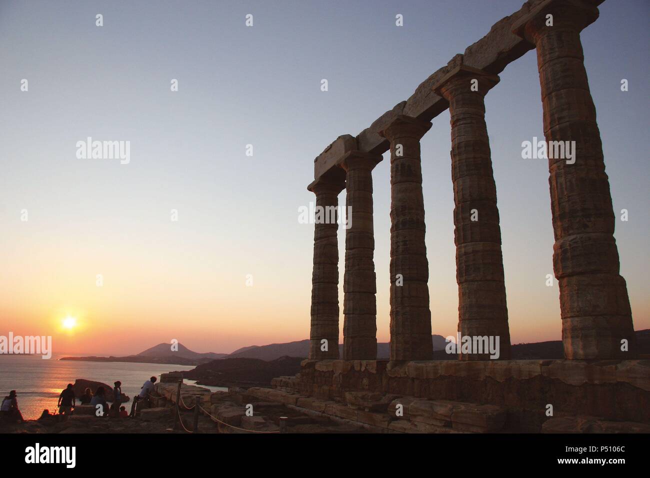 Greek Art. Temple of Poseidon. Doric style. Was built in the 5th century BC. Sunset. Cap Sounion. Peloponessos. Greece. Europe. Stock Photo