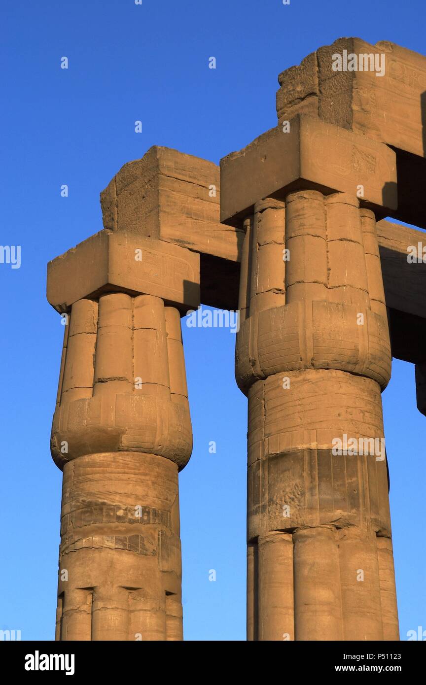 EGYPT. TEMPLE OF LUXOR. Fasciculatesd columns with papyrus capitals of hypostyle. New Kingdom. Ancient Thebes 'Waset. Stock Photo