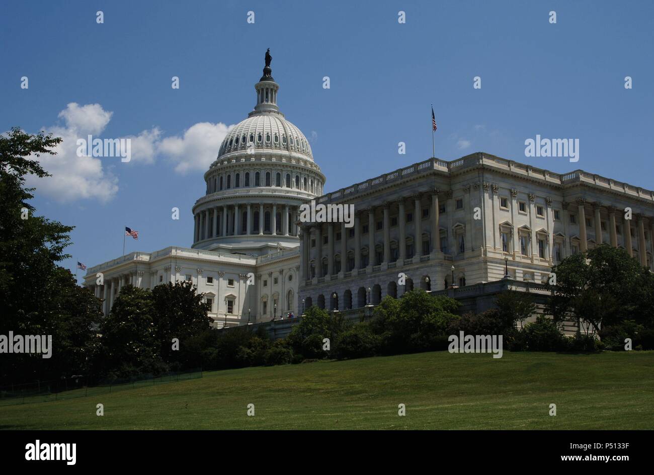 United States. Washington D.C. United States Capitol. Built by William Thornton and continued by Charles Bulfinch and Benjamin Henry Latrobe. The dome (1854-1865) is by Thomas U. Walte. Stock Photo