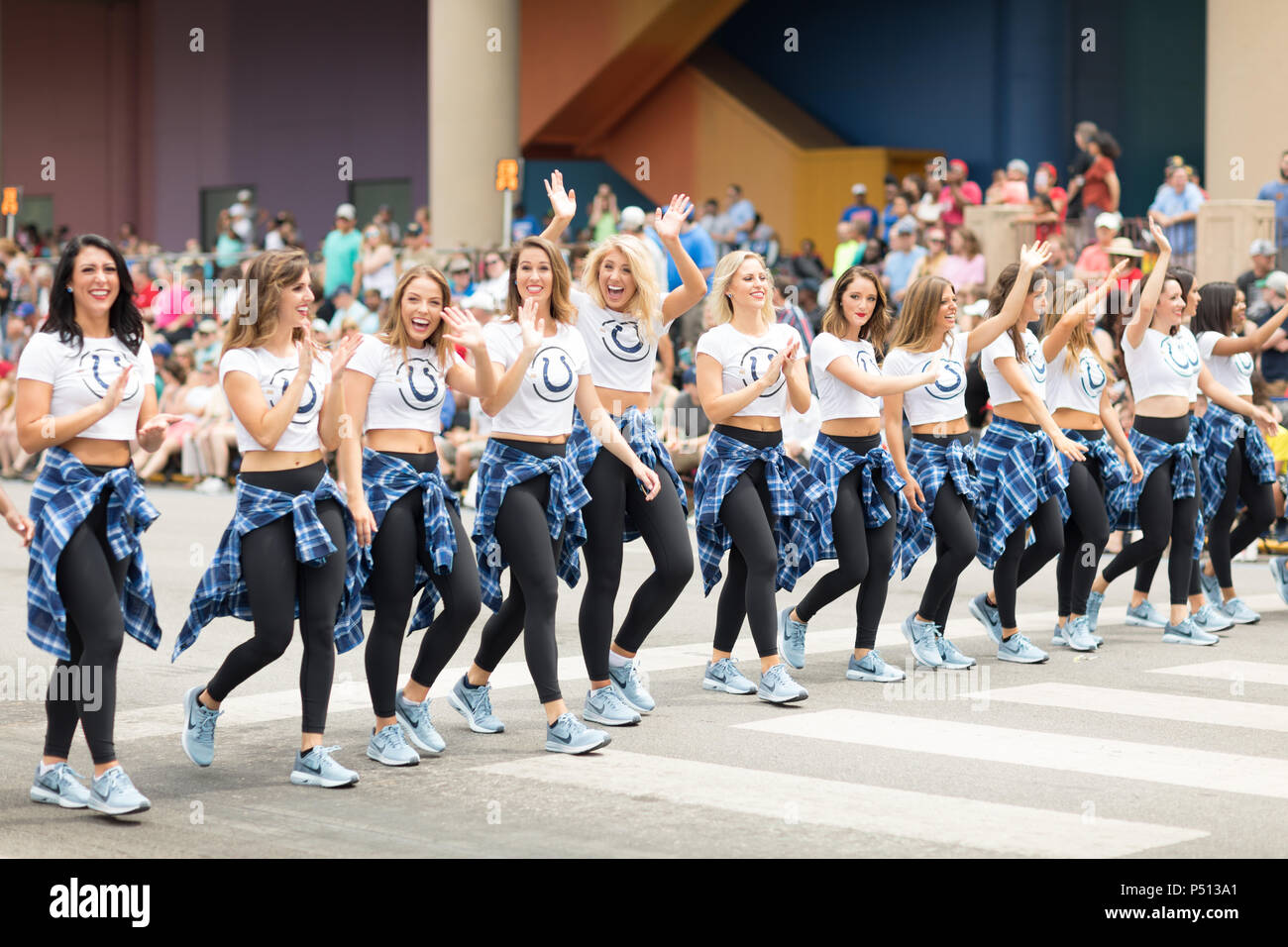 Indianapolis, Indiana, USA - May 26, 2018,  The Colts Cheerleaders walk down the street at  the Indy 500 Parade Stock Photo