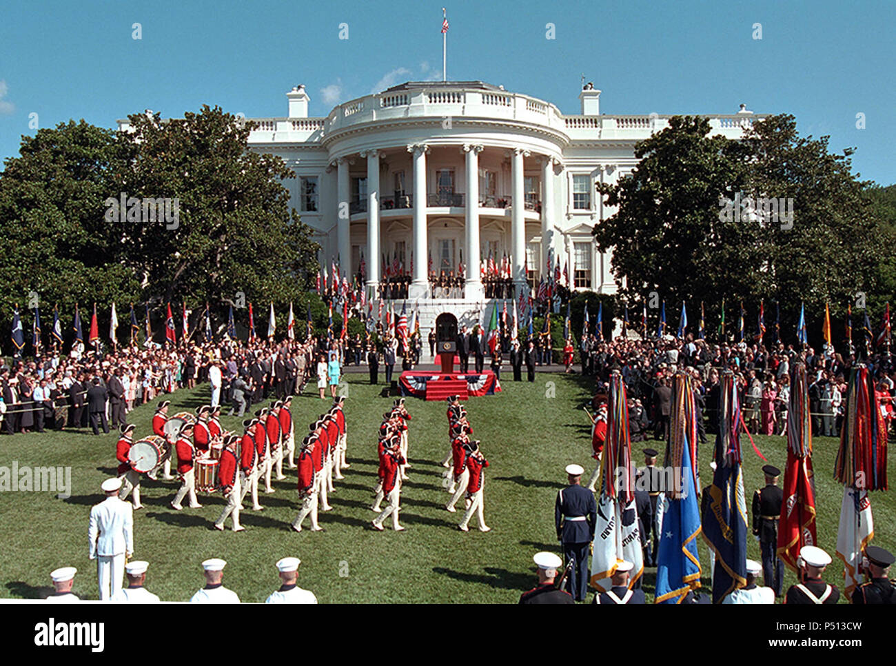 President George W. Bush and Mexico President Vicente Fox participate in the Musical Troop in Review (Army Fife and Drum Corps) during the State Arrival ceremony Wednesday, Sept. 5, 2001, on the South Lawn of the White House. Stock Photo