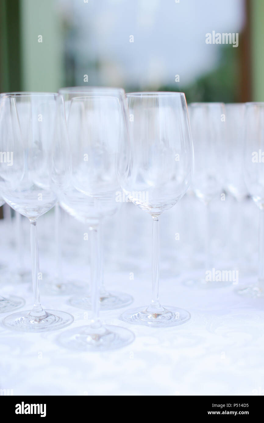Many empty wineglasses on table. Stock Photo