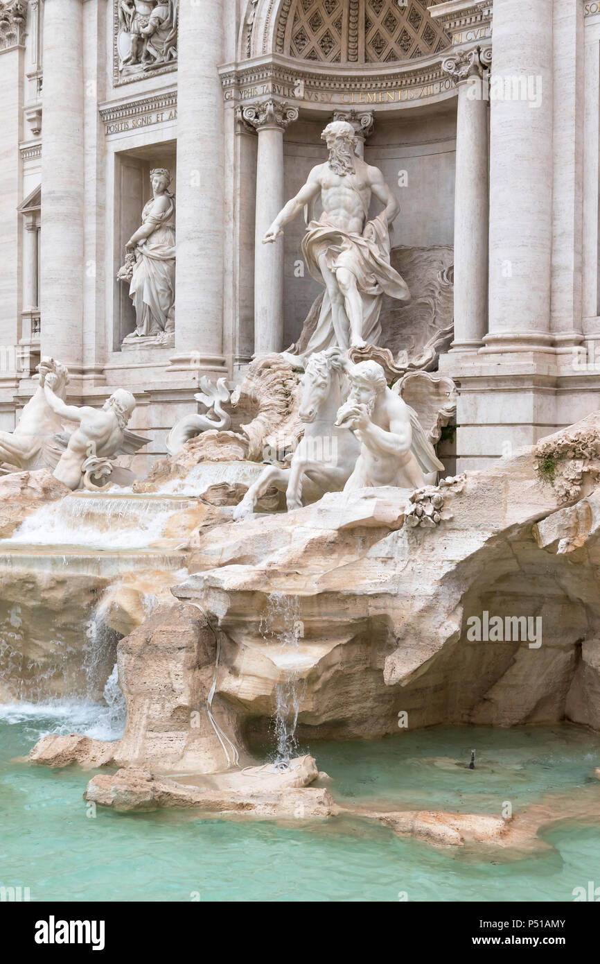 Side view of the statues of the Trevi Fountain in Rome. Italy. Vertically. Stock Photo