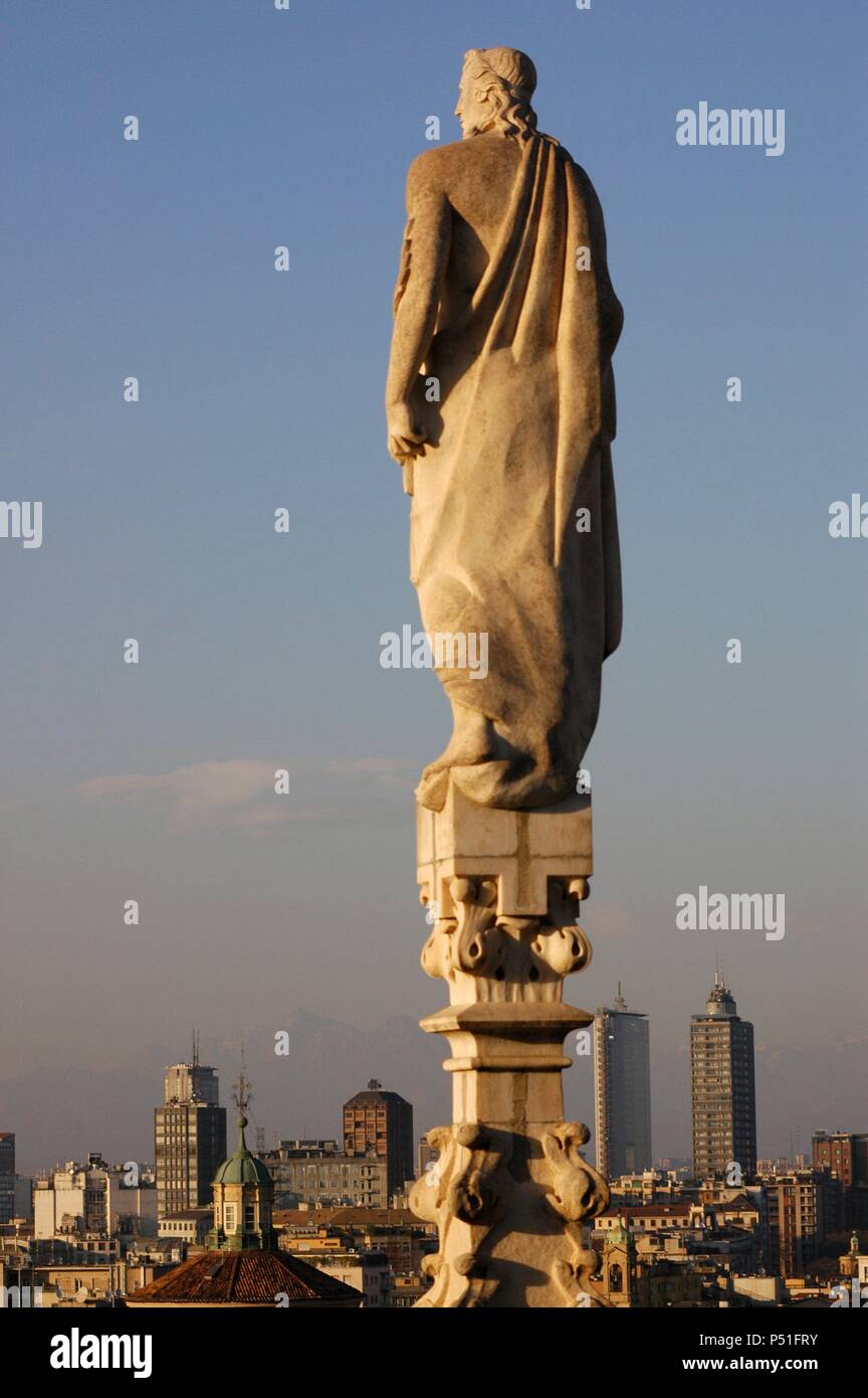 Italy. Milan. Cathedral. Gothic. 14th century. Statue in the spire. Stock Photo
