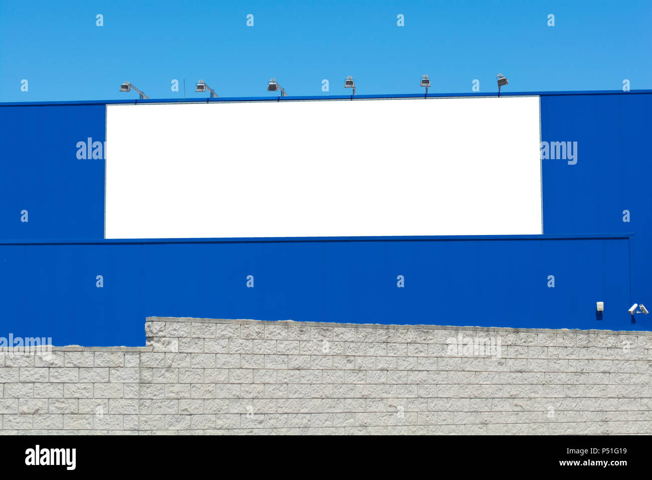Blank Billboard On Brick And Blue Wall Banner Edge And Grommets