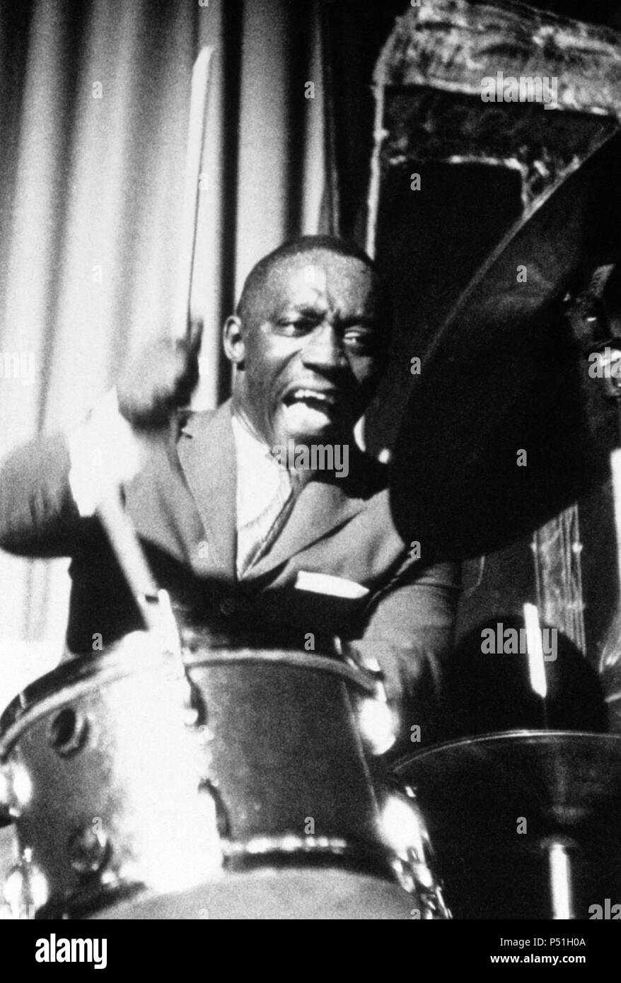 American jazz drummer and bandleader Art Blakey plays a fast figure