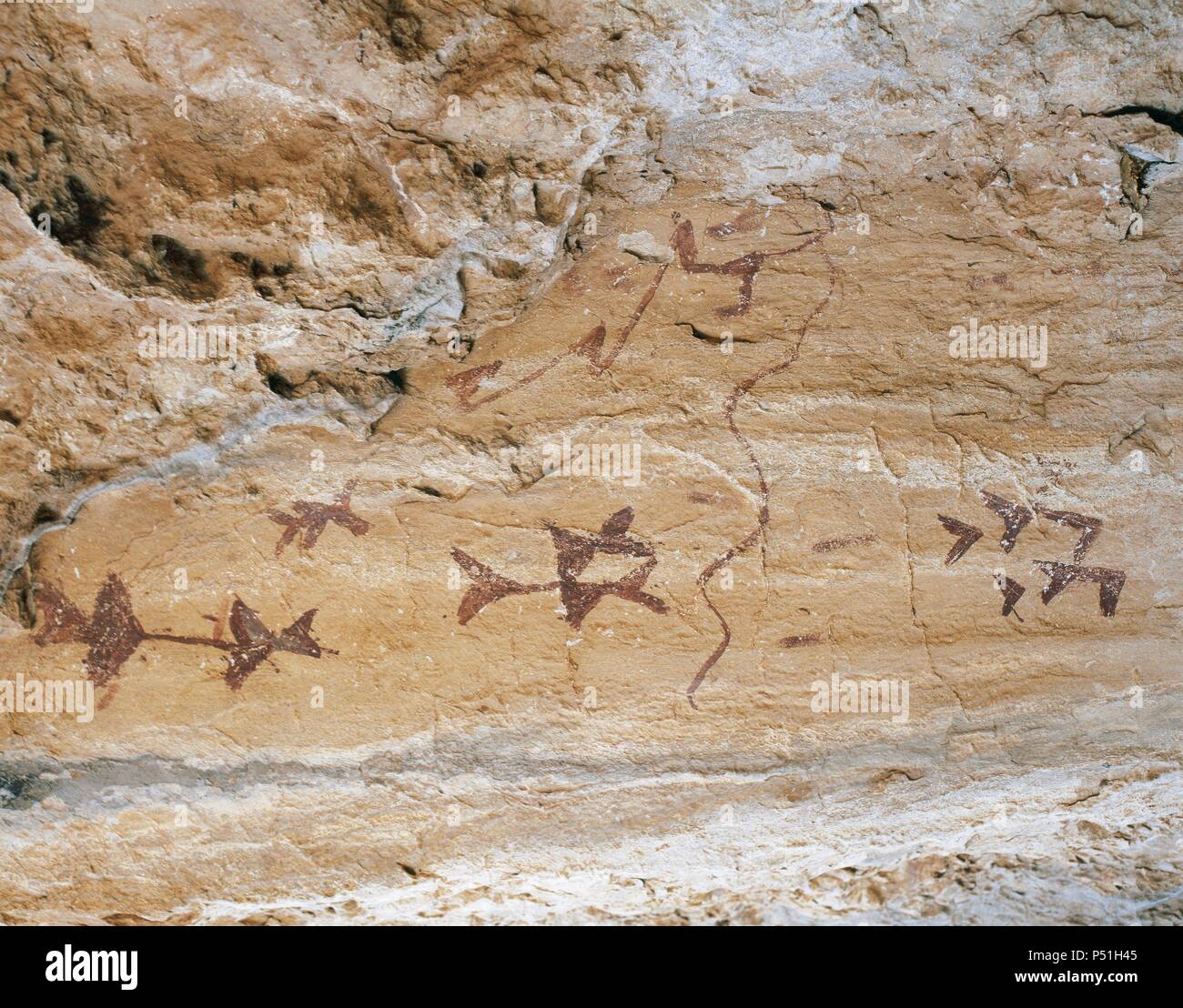 Prehistoric Art. Mesolithic. Levantine style. Schematic painting. Cave of Los Letreros. Velez Rubio. Andalusia. Spain. Stock Photo
