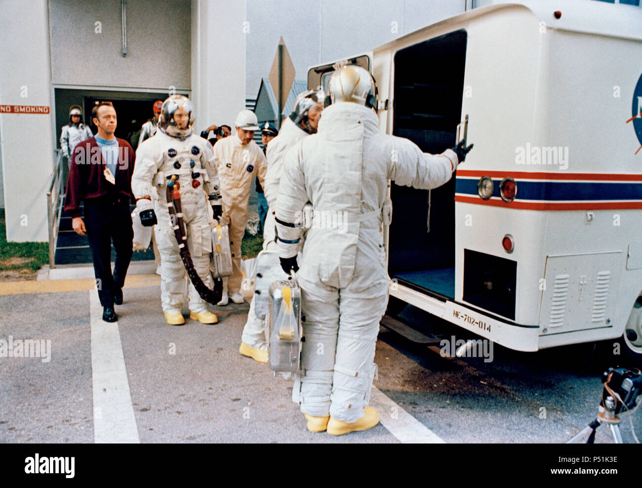 The Apollo 9 crew leaves the Kennedy Space Center's Manned Spacecraft Operations Building during the Apollo 9 prelaunch countdown. Stock Photo