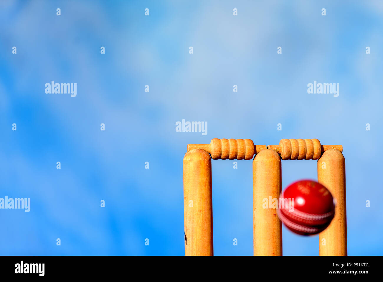Cricket Ball about to hit stumps Stock Photo Alamy